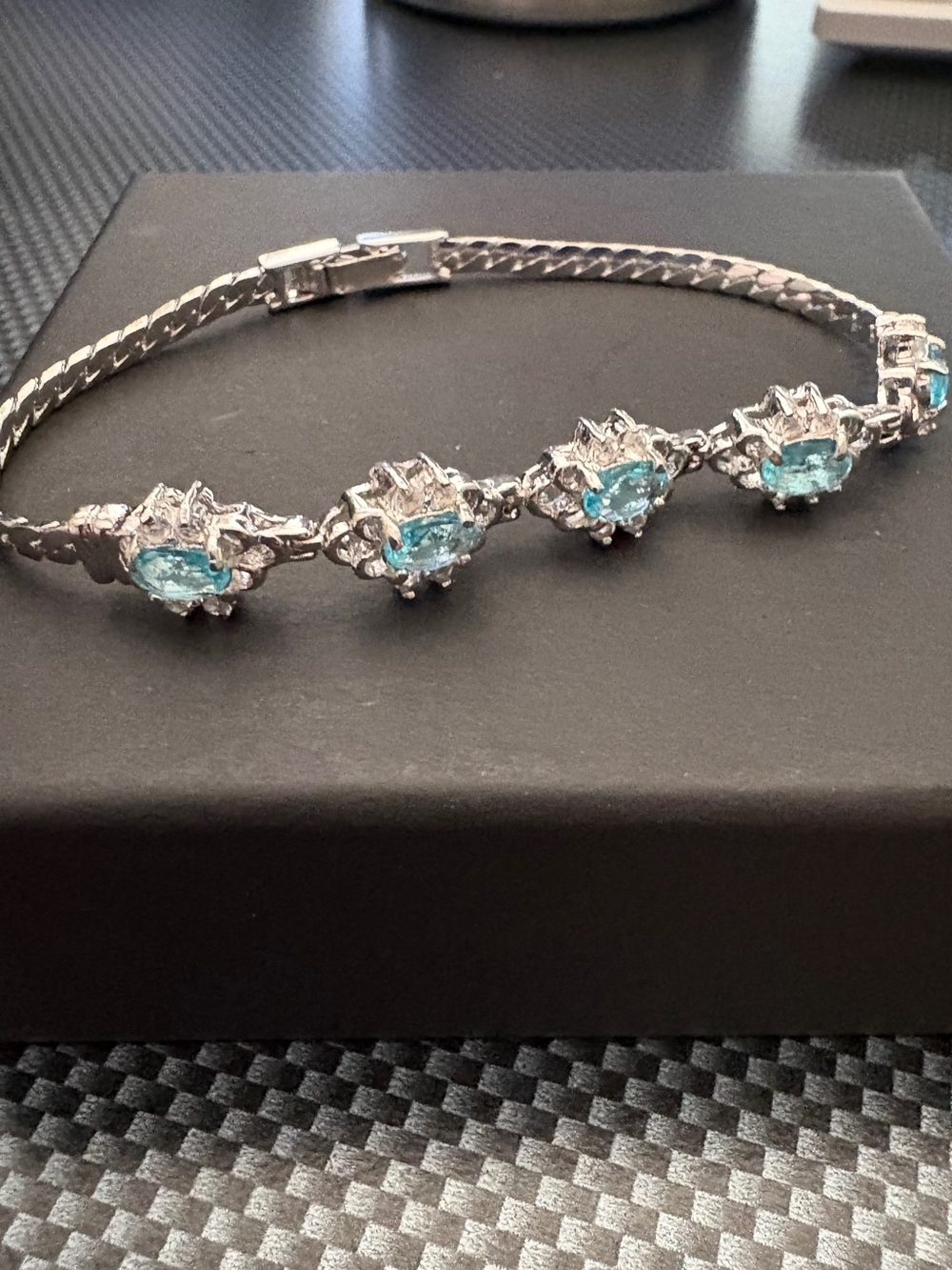 Sterling Silver Blue Topaz Floral Link Bracelet